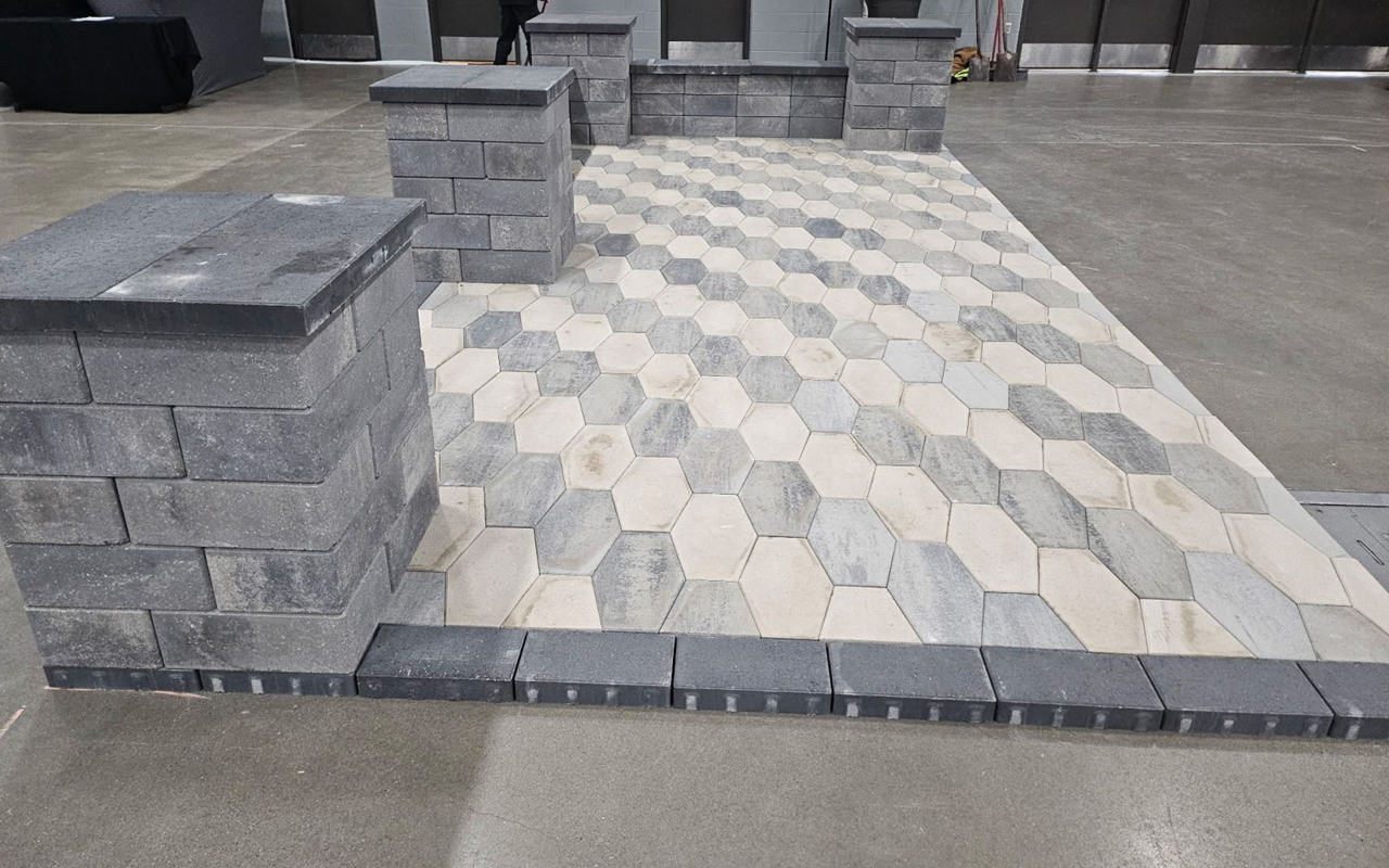 Commercial hardscaping in Des Moines: an indoor patio installation within a corporate conference room to create a seamless indoor-outdoor feel.